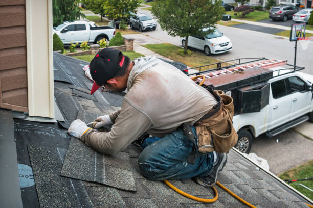 Professional Roofing technician working in Irons, MI